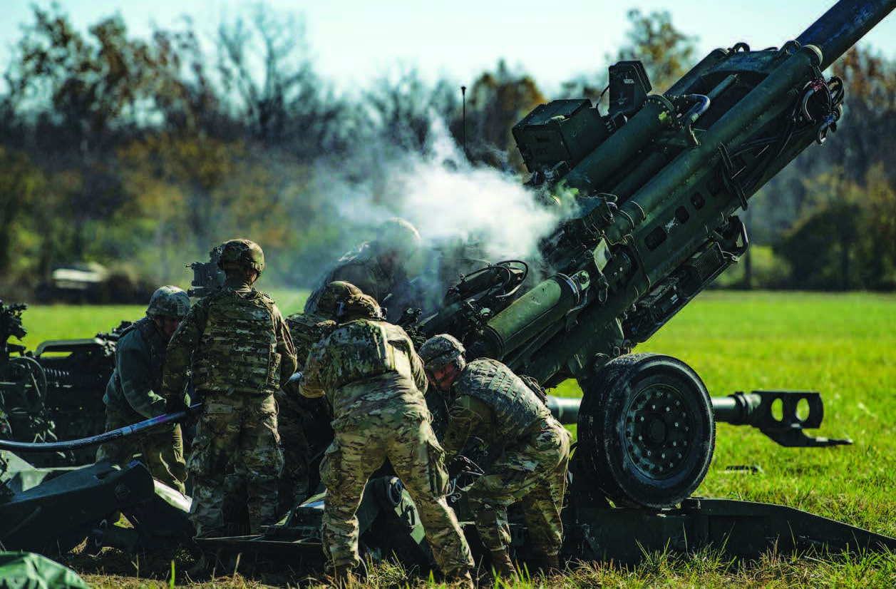 Soldiers with Indiana Army National Guard conduct field artillery fire mission during exercise Bold Quest 20.2 at Camp Atterbury, Indiana,
October 31, 2020 (U.S. Air Force/Joel Pfiester) 